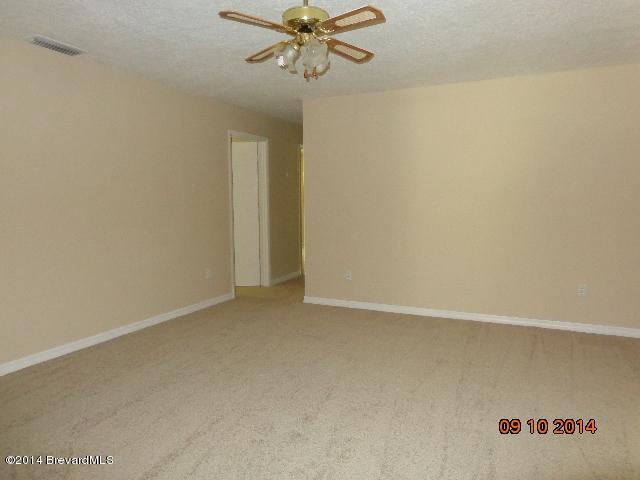 2706 Fox Trail Court Cocoa, FL 32926 - Photo 3 of 12 Family room