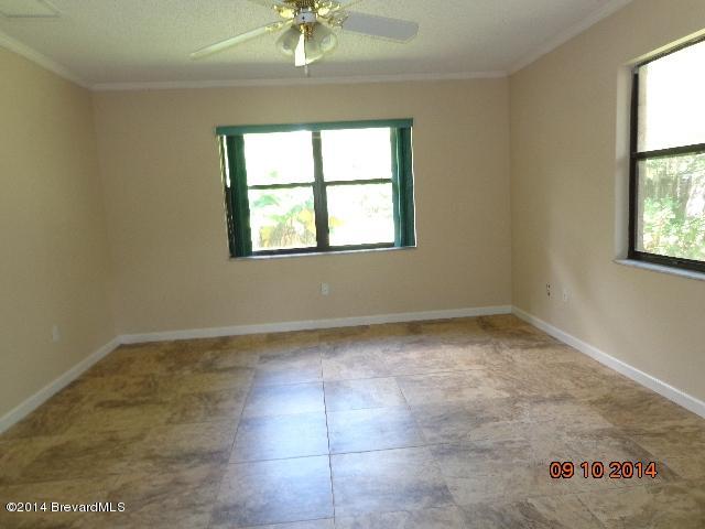 2706 Fox Trail Court Cocoa, FL 32926 - Photo 10 of 12 Mater bedroom