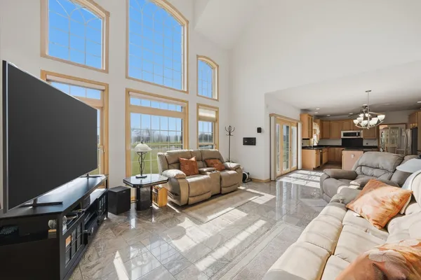 a view of a dining room with furniture window and outside view