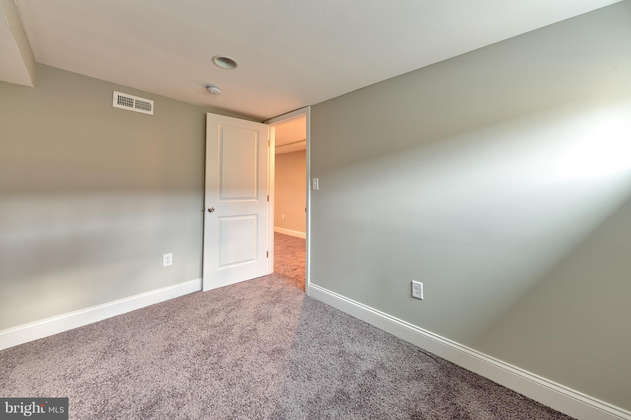 99 Willow Spring Road Baltimore, MD 21222 - Photo 17 of 30 a view of an empty room