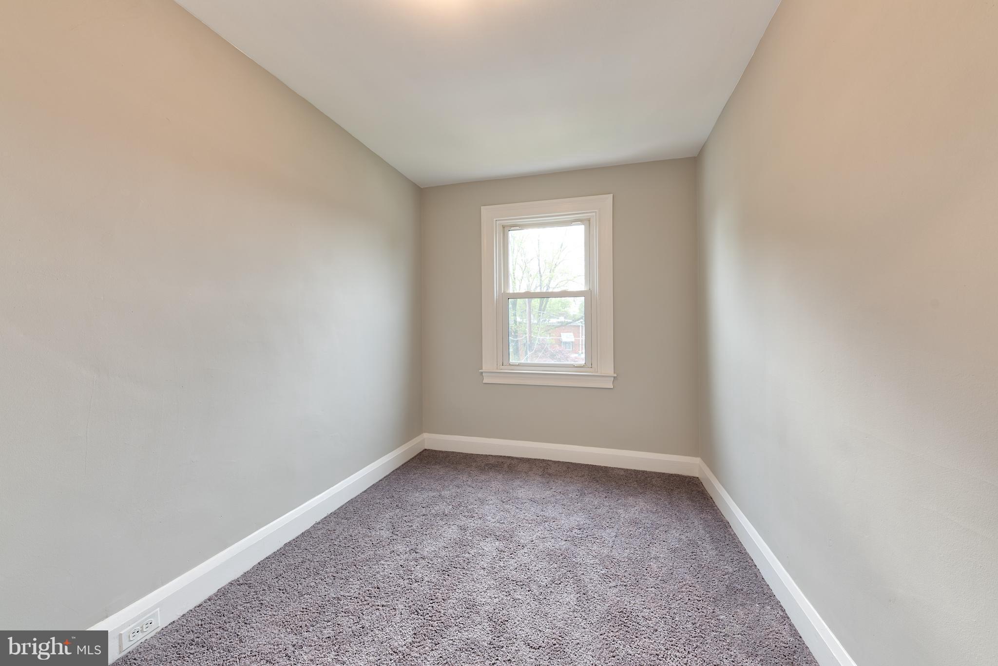 99 Willow Spring Road Baltimore, MD 21222 - Photo 20 of 30 an empty room with a window