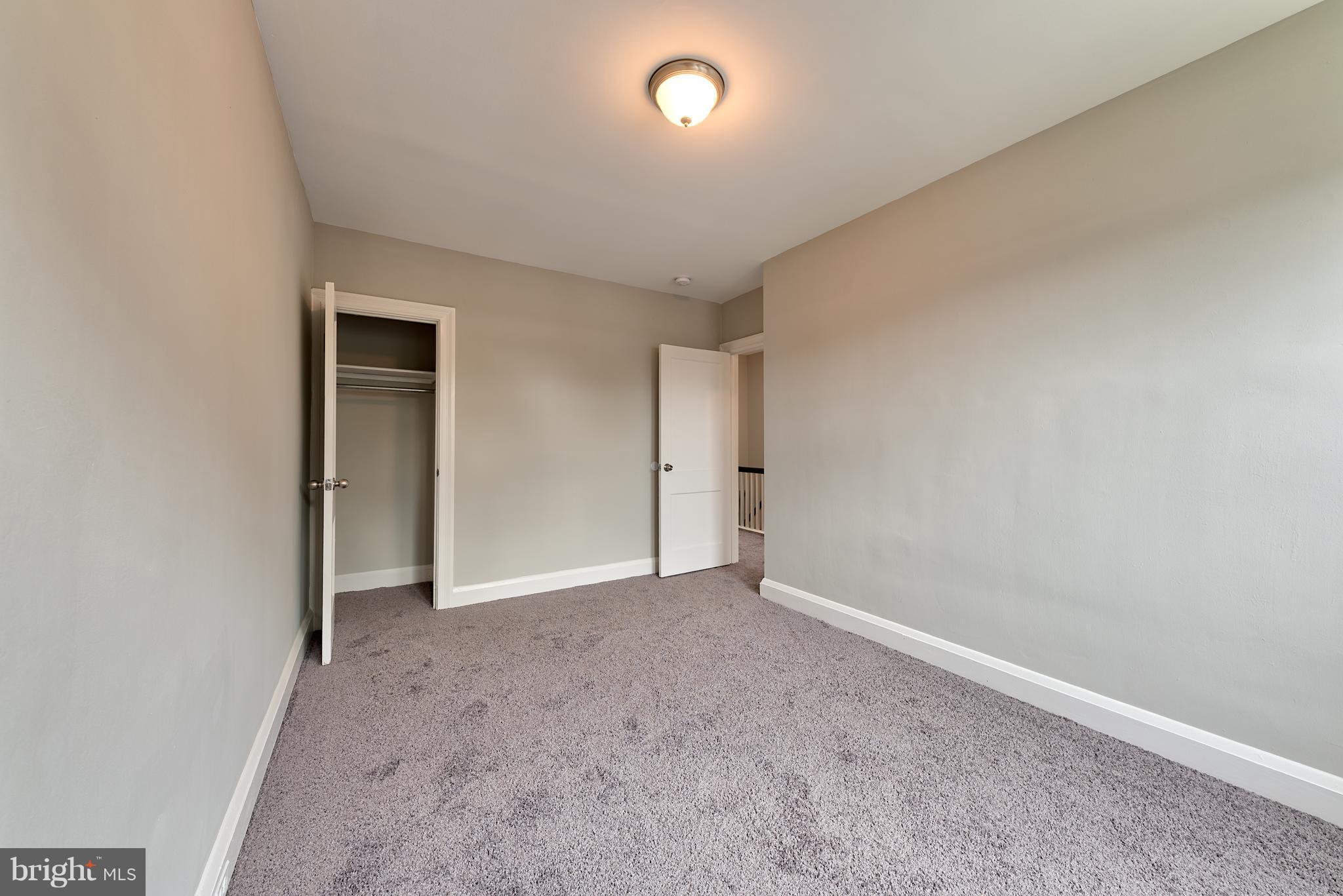 99 Willow Spring Road Baltimore, MD 21222 - Photo 24 of 30 a view of an empty room and a window