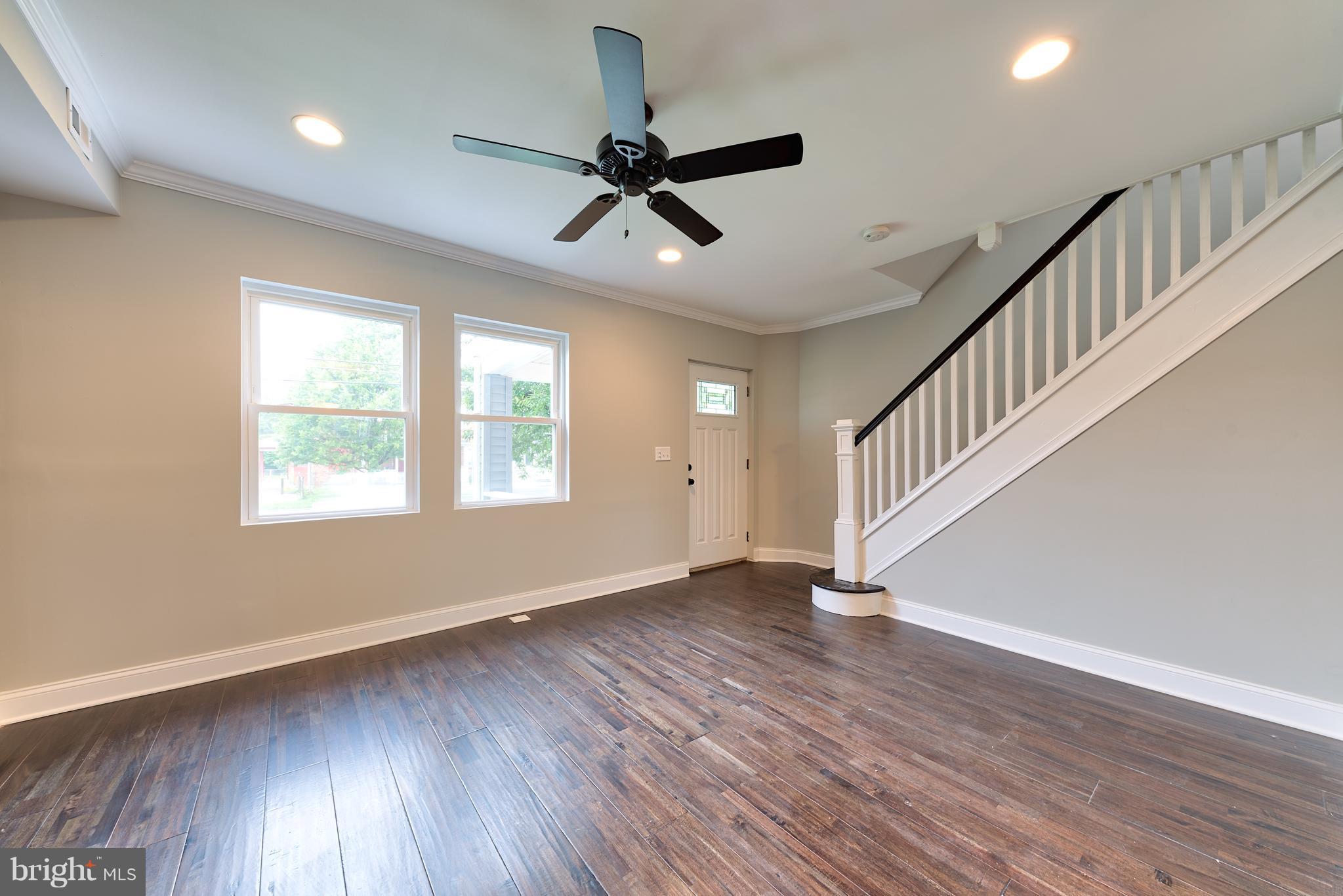 99 Willow Spring Road Baltimore, MD 21222 - Photo 6 of 30 a view of an entryway with wooden floor