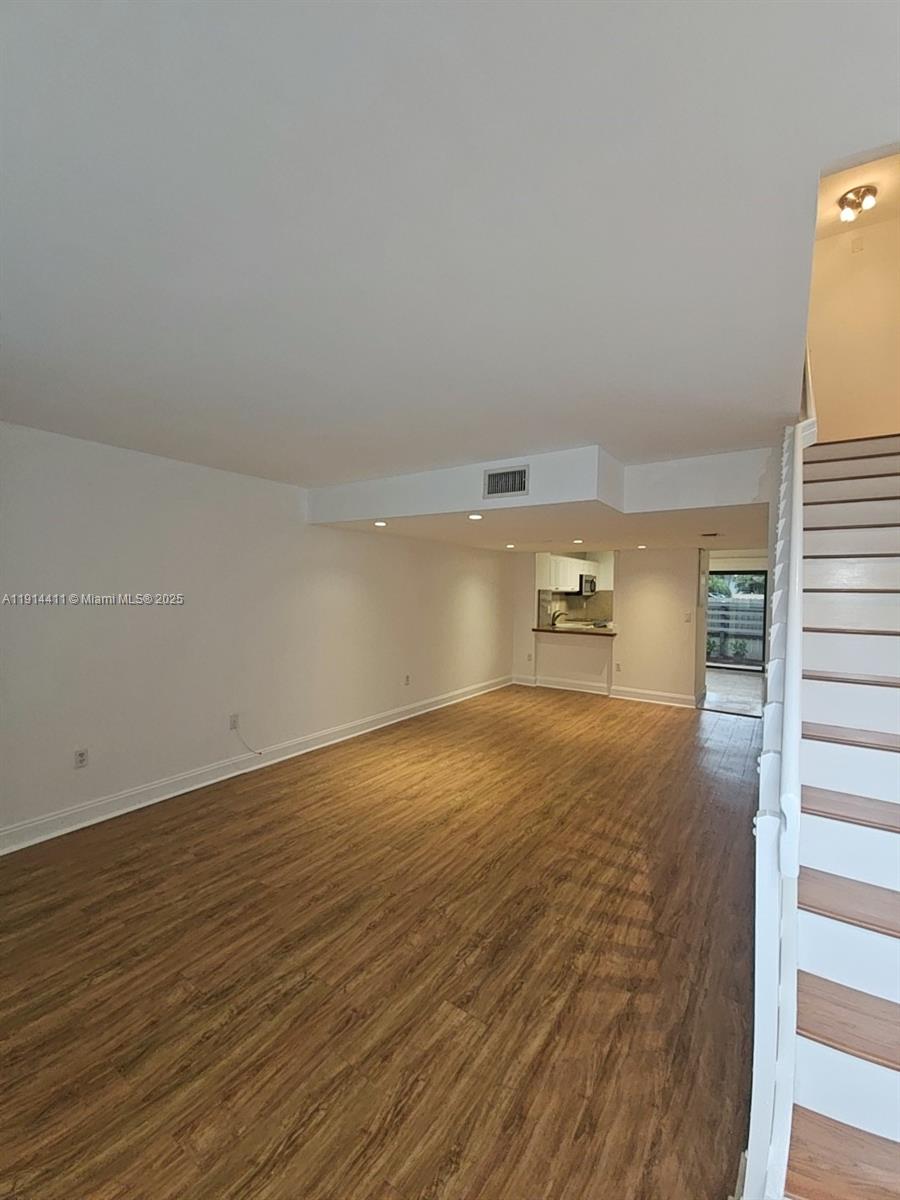 7870 Southwest 102nd Lane Miami, FL 33156 - Photo 2 of 41 a view of empty room with wooden floor