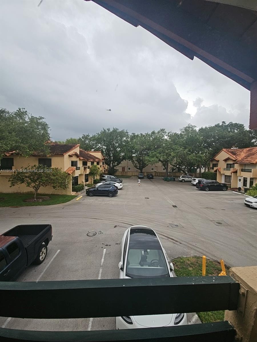 7870 Southwest 102nd Lane Miami, FL 33156 - Photo 24 of 41 a view of car parked on the side of a lake