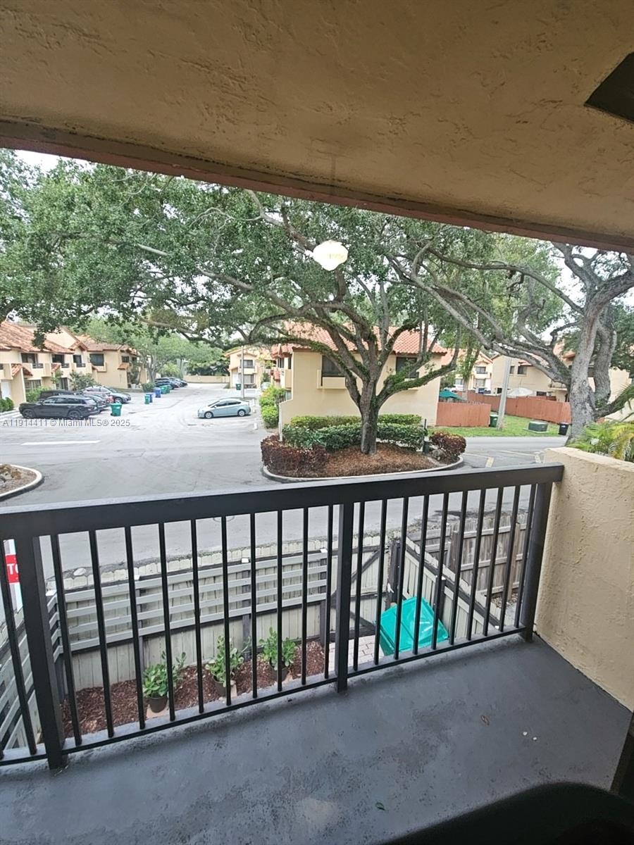 7870 Southwest 102nd Lane Miami, FL 33156 - Photo 33 of 41 a balcony with street view
