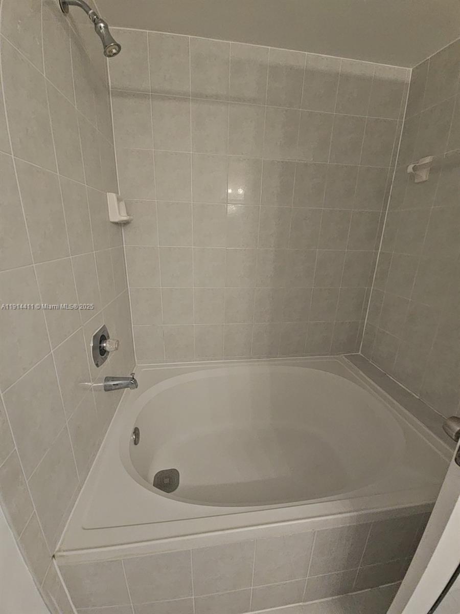 7870 Southwest 102nd Lane Miami, FL 33156 - Photo 35 of 41 a close view of a bathtub in bathroom