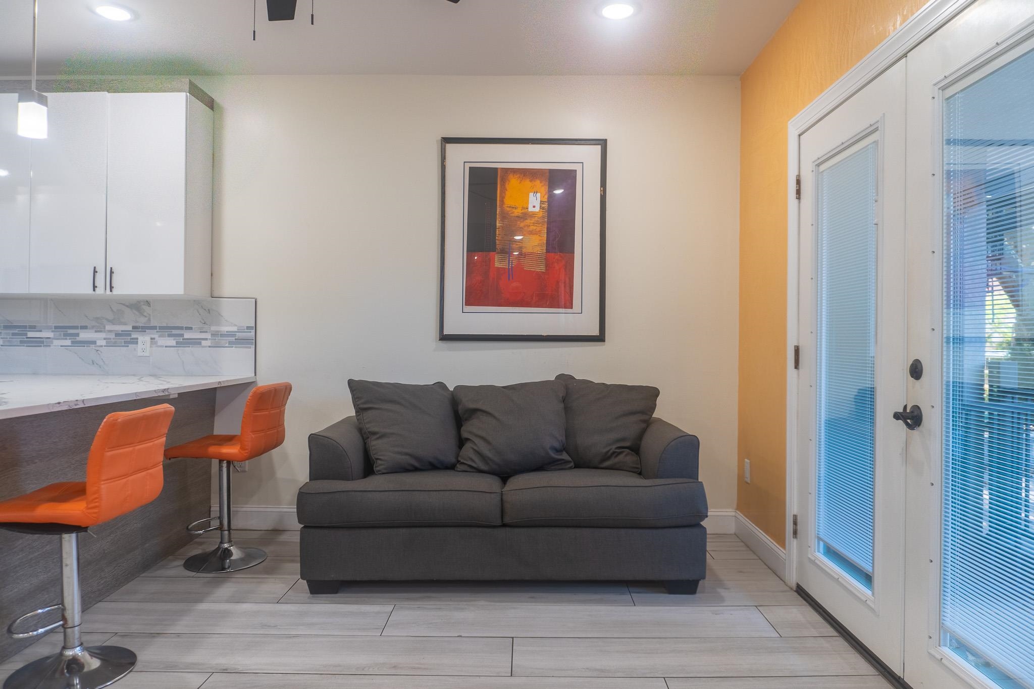 a living room with furniture and a window