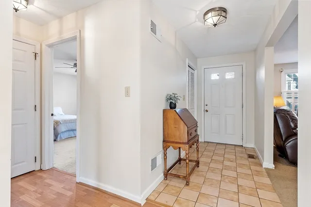 a bathroom with a sink vanity and a mirror