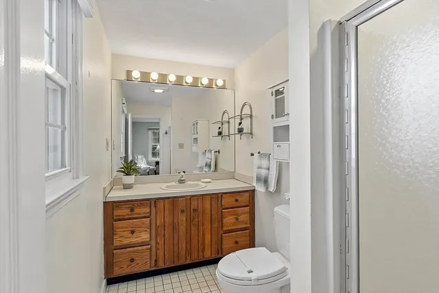 a view of a livingroom with furniture and chandelier