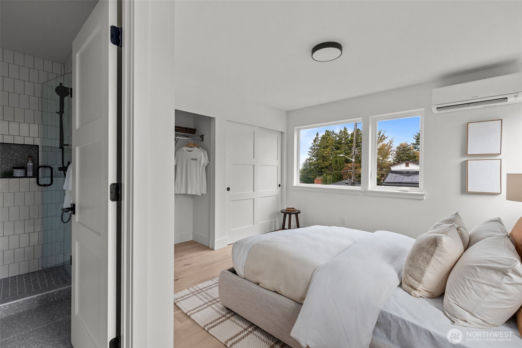 8405 42nd Avenue Southwest Seattle, WA 98136 - Photo 18 of 34 a bedroom with a bed and a window