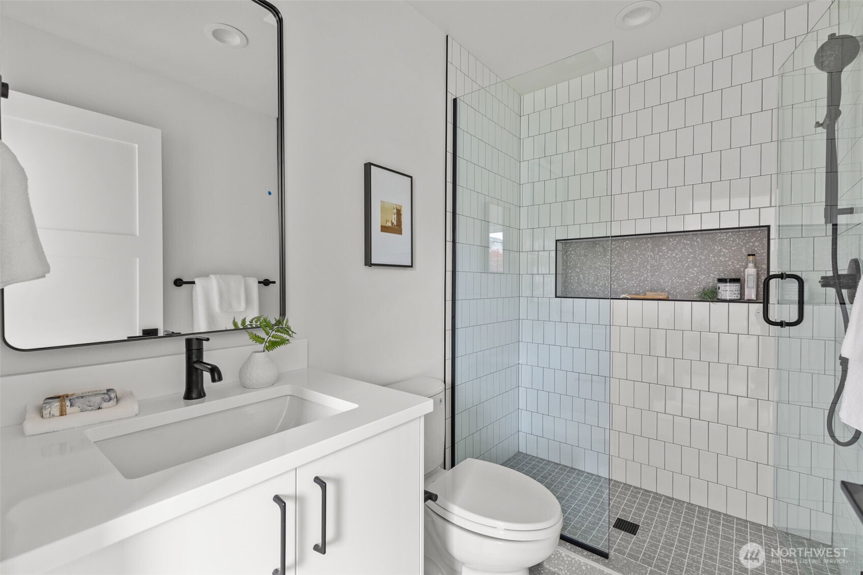 8405 42nd Avenue Southwest Seattle, WA 98136 - Photo 23 of 34 a bathroom with a sink toilet and shower