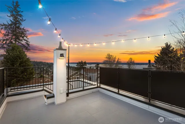 a view of a balcony with floor to ceiling window