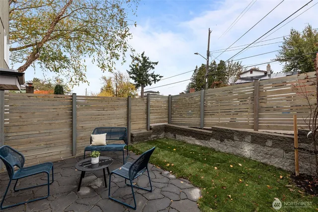 a view of a bench in a backyard