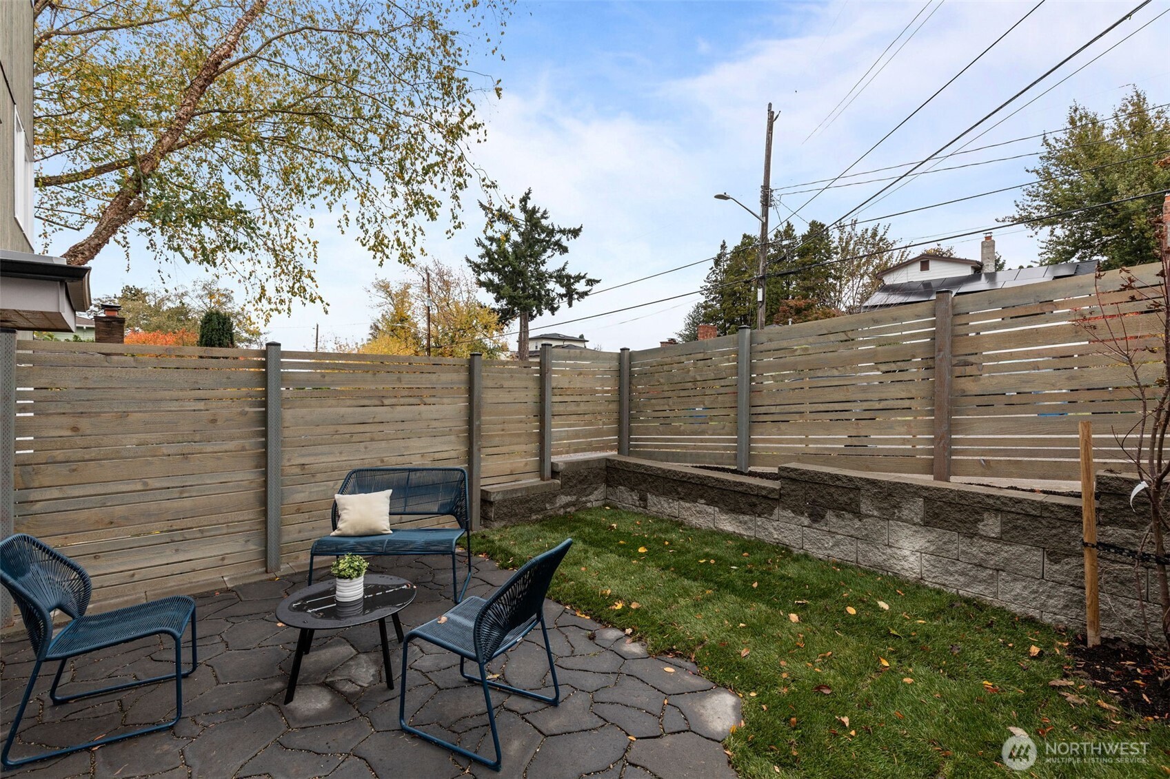 8405 42nd Avenue Southwest Seattle, WA 98136 - Photo 33 of 34 a view of a bench in a backyard