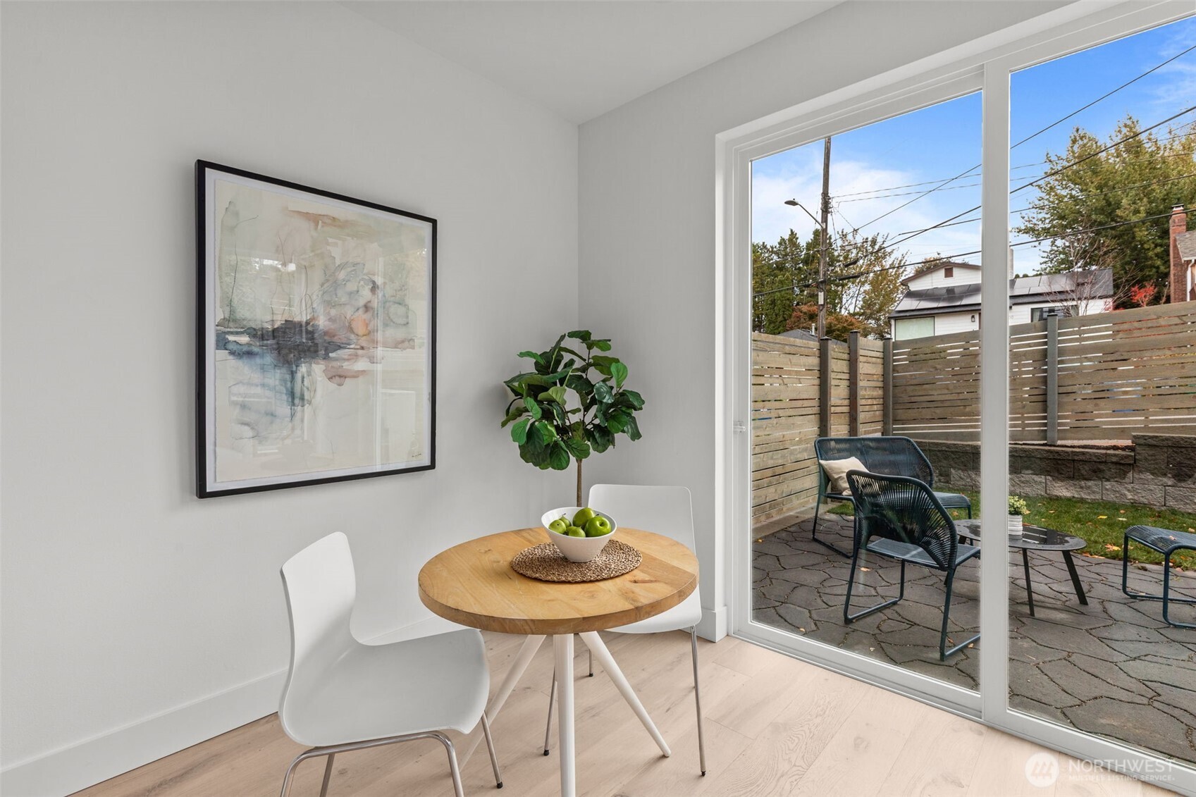 8405 42nd Avenue Southwest Seattle, WA 98136 - Photo 10 of 34 a living room with furniture and a potted plant