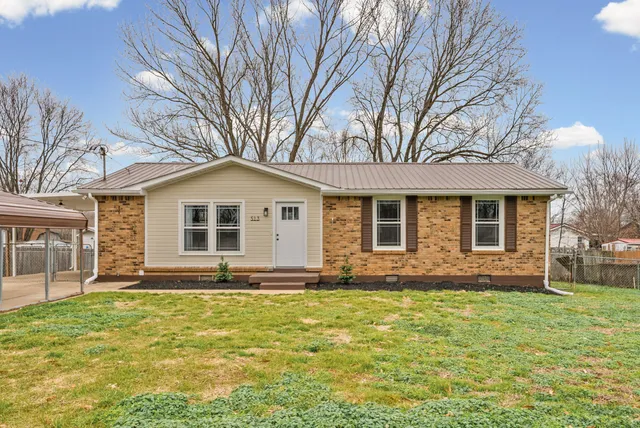 a front view of house with yard