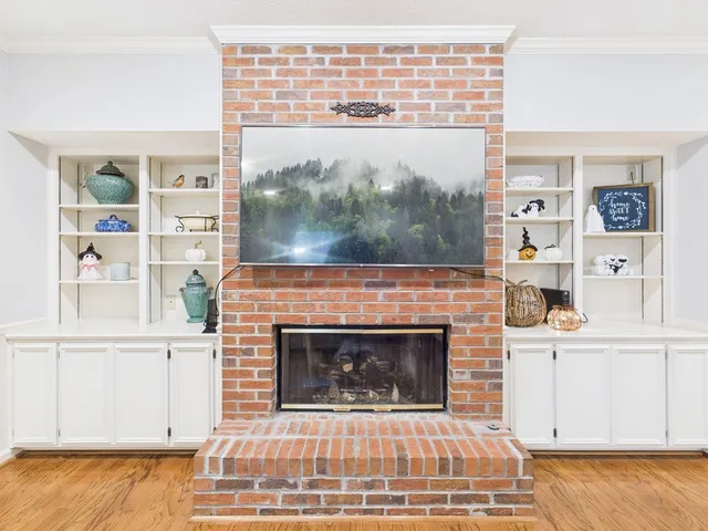 a living room with a fireplace