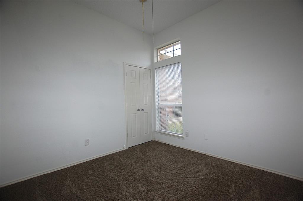 122 Princeton Circle Forney, TX 75126 - Photo 13 of 17 an empty room with windows