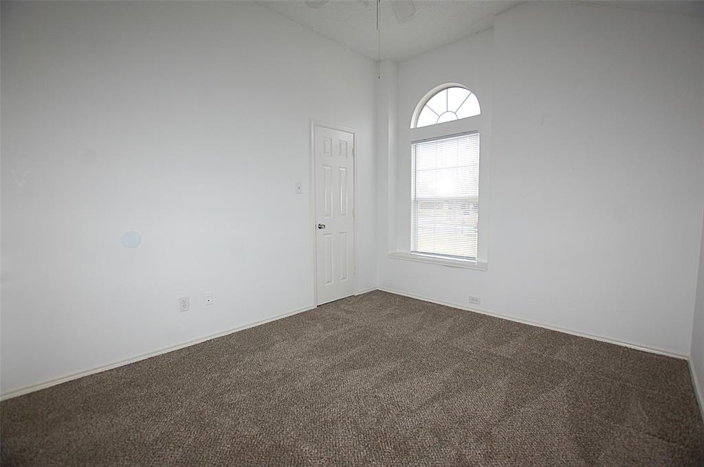 122 Princeton Circle Forney, TX 75126 - Photo 15 of 17 an empty room that has a window