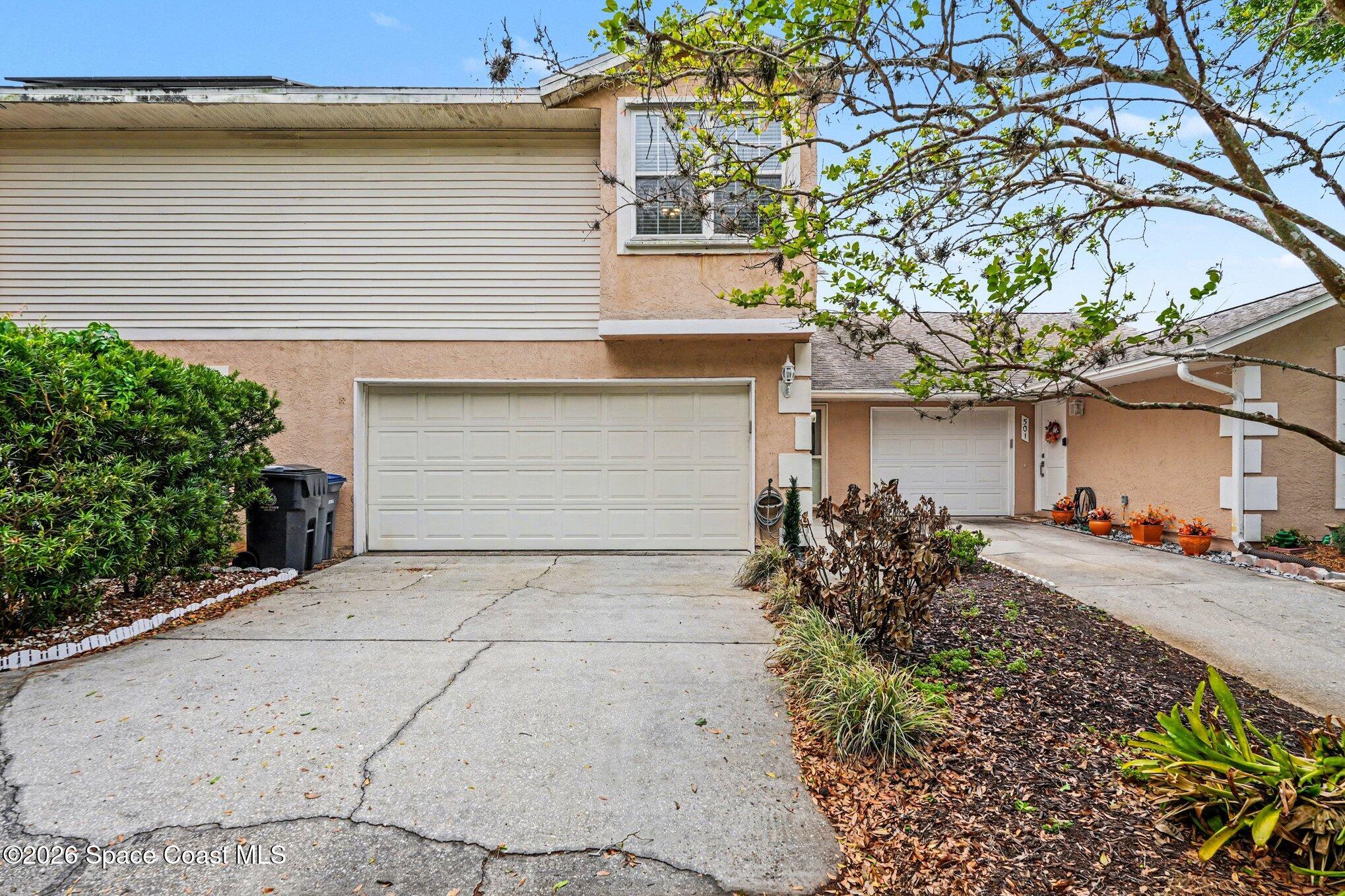 499 Arbor Ridge Lane Titusville, FL 32780 - Photo 1 of 28 Front of Home