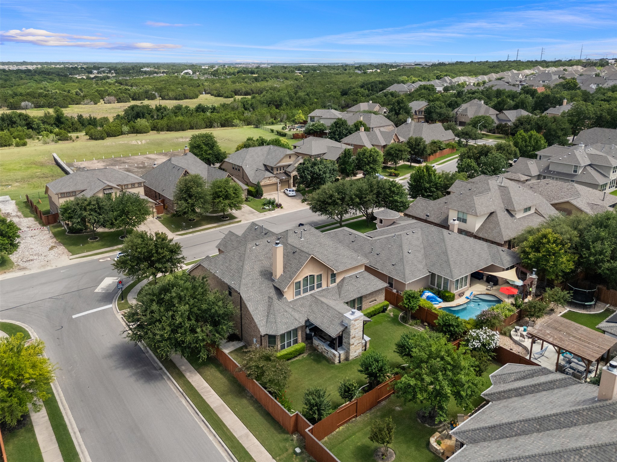 3021 Wedgescale Pass Leander, TX 78641 - Photo 39 of 40 an aerial view of residential houses with outdoor space and trees