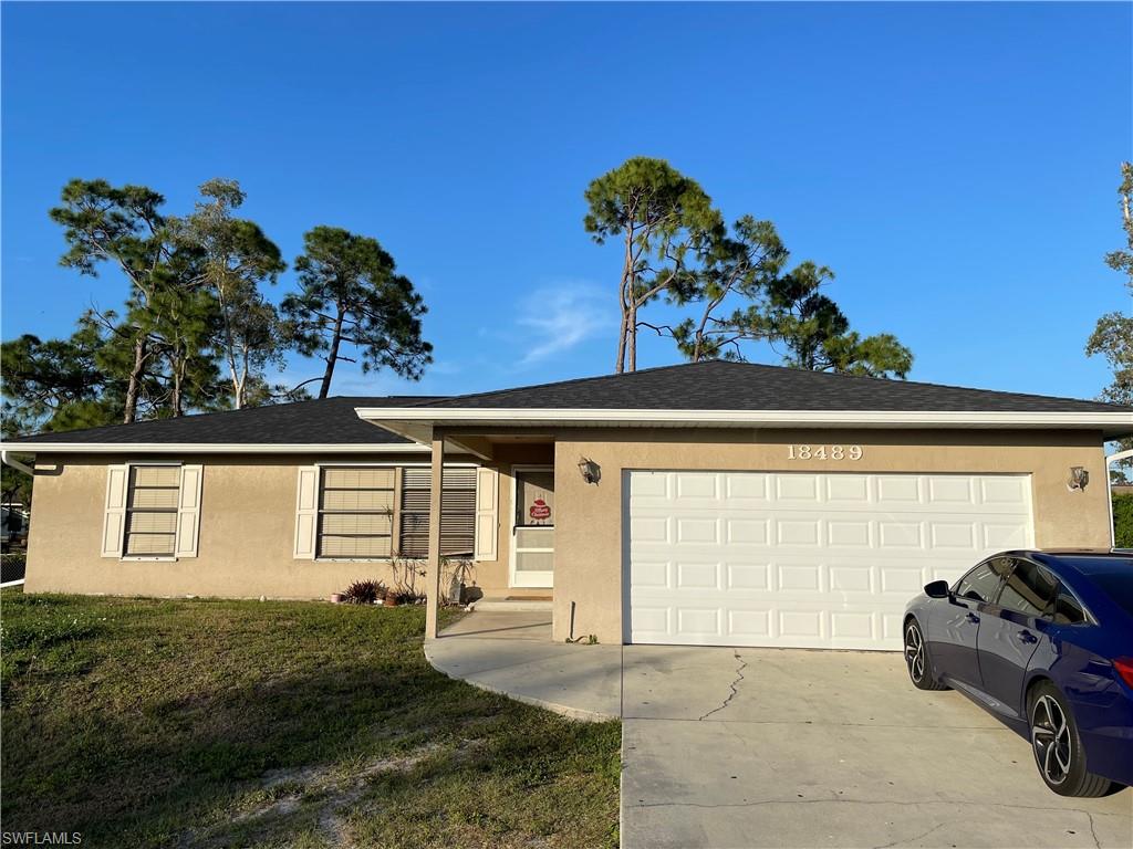 18489 Sunflower Road Fort Myers, FL 33967 - Photo 1 of 1 a front view of a house with a porch