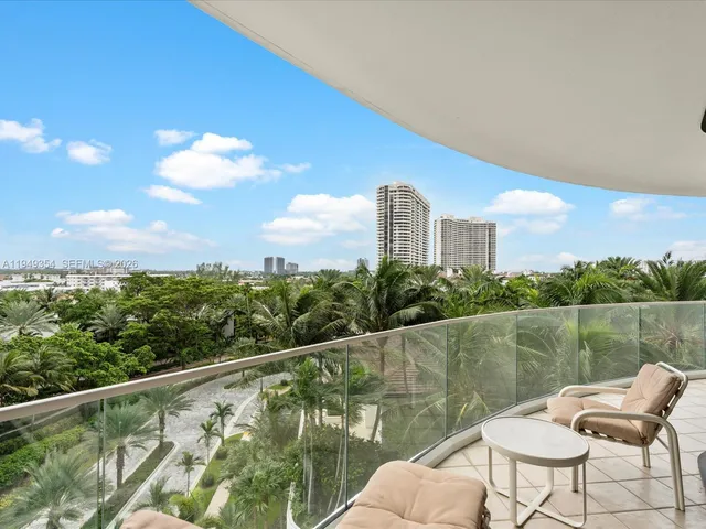 a view of balcony with furniture