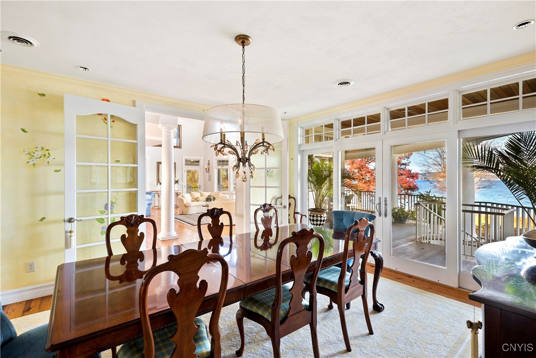 1818 West Lake Road Skaneateles, NY 13152 - Photo 17 of 48 Dining Room leading out to covered veranda