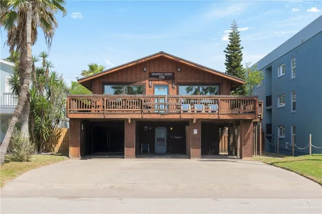 a front view of a house with a garage