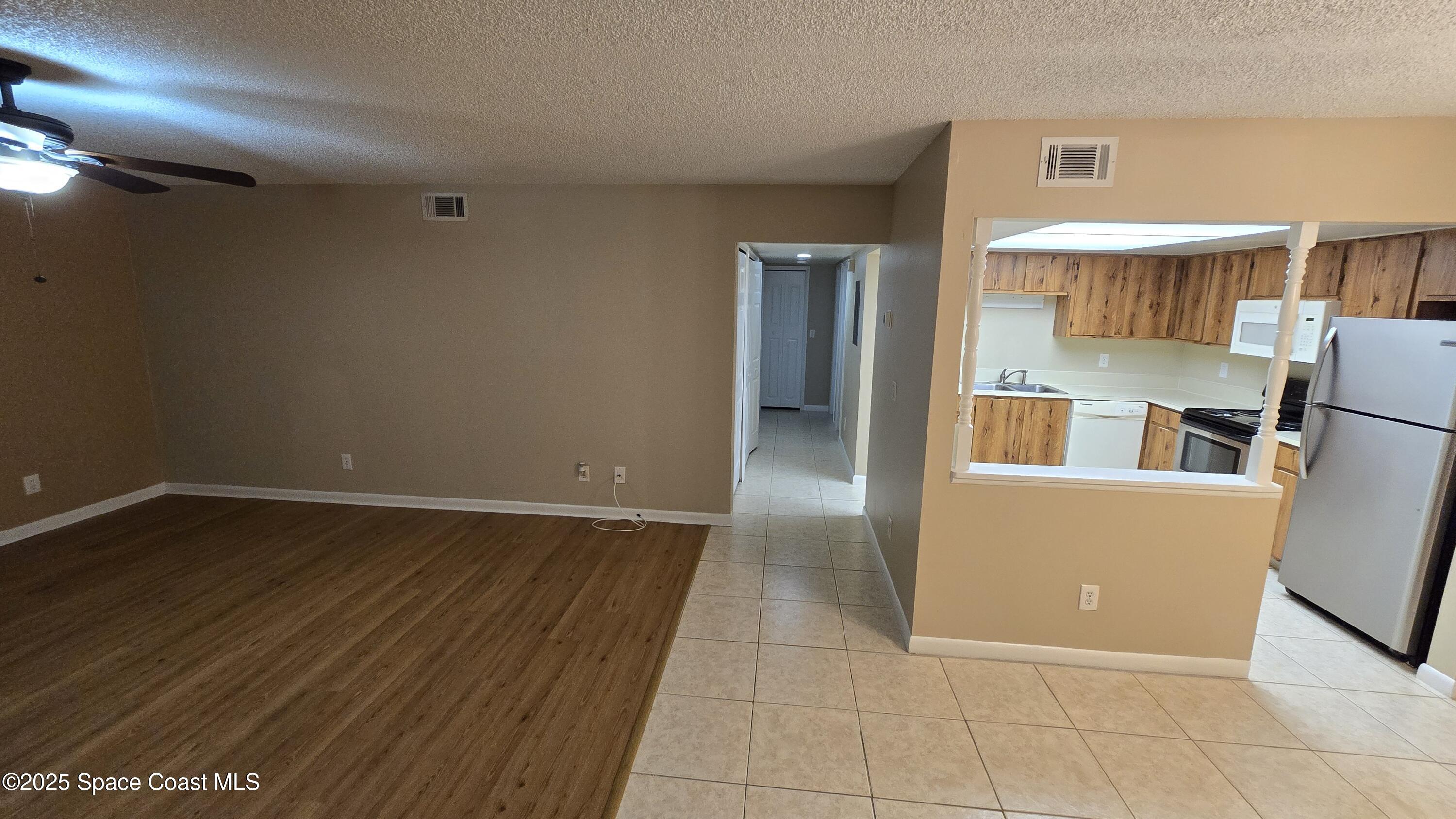 3213 Murrell Road, Unit 103 Rockledge, FL 32955 - Photo 4 of 13 20251006_122842