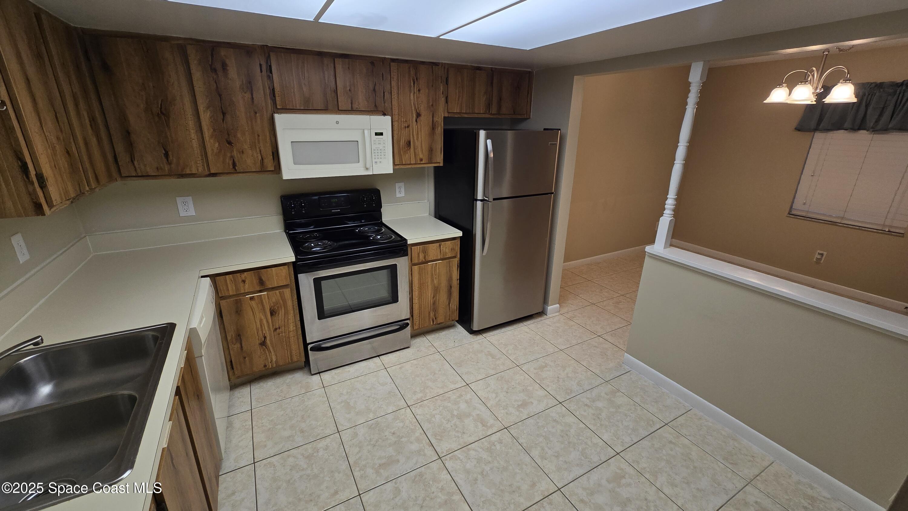 3213 Murrell Road, Unit 103 Rockledge, FL 32955 - Photo 6 of 13 20251006_122702