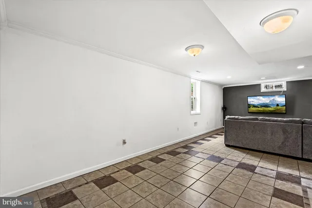 a bathroom with a toilet a sink and shower