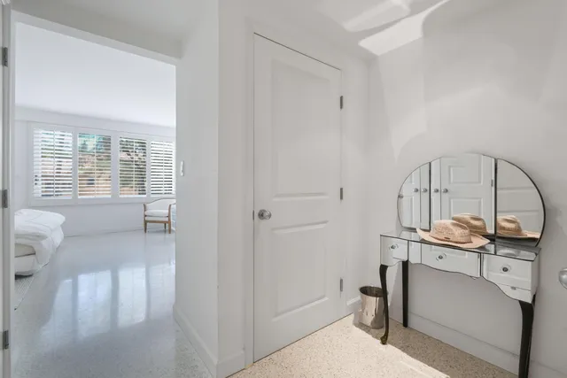 a bathroom with a toilet tub and shower