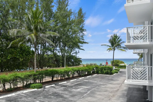 a view of a swimming pool with a lounge chairs