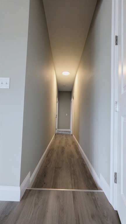31 Cross Street Boylston, MA 01505 - Photo 37 of 42 a view of a hallway with wooden floor