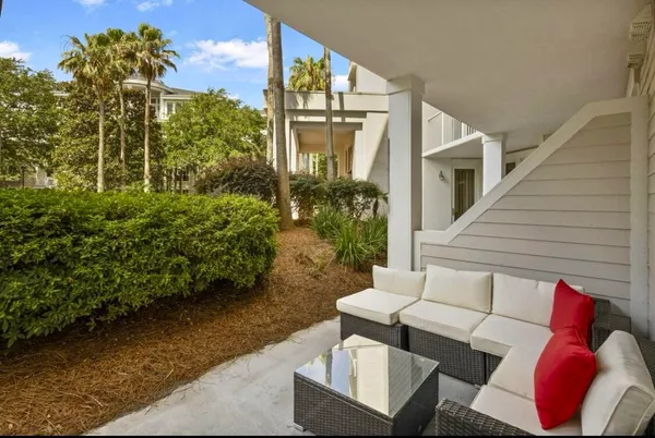 a view of balcony with furniture