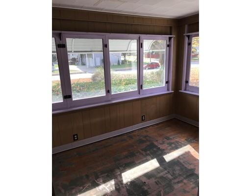 1241 Allen Street Springfield, MA 01118 - Photo 8 of 11 a view of an empty room with a window