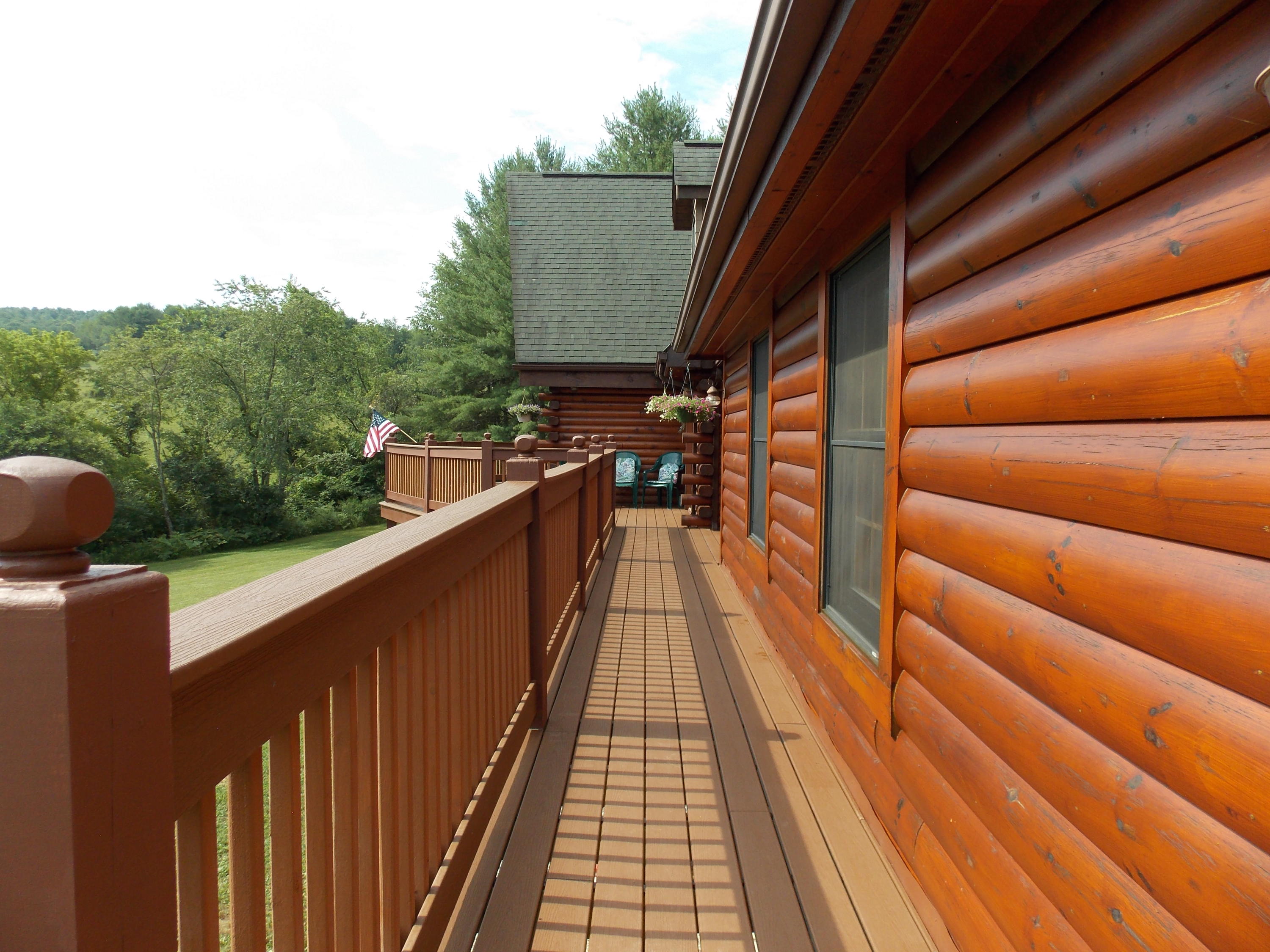 124 Ridgeview Road Northwest Floyd, VA 24091 - Photo 15 of 67 a view of balcony with wooden floor and outdoor seating
