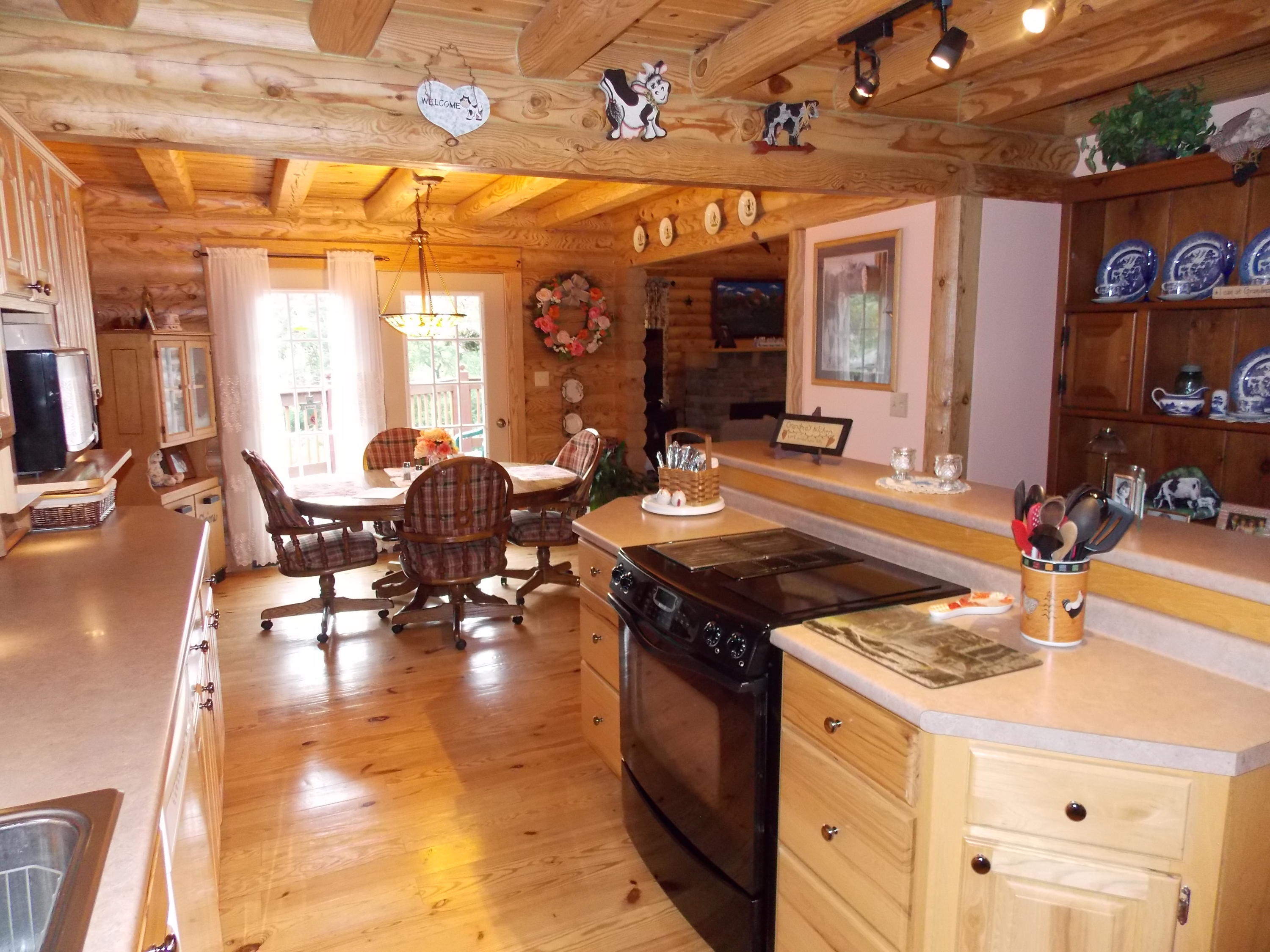124 Ridgeview Road Northwest Floyd, VA 24091 - Photo 27 of 67 a kitchen with a stove and cabinets