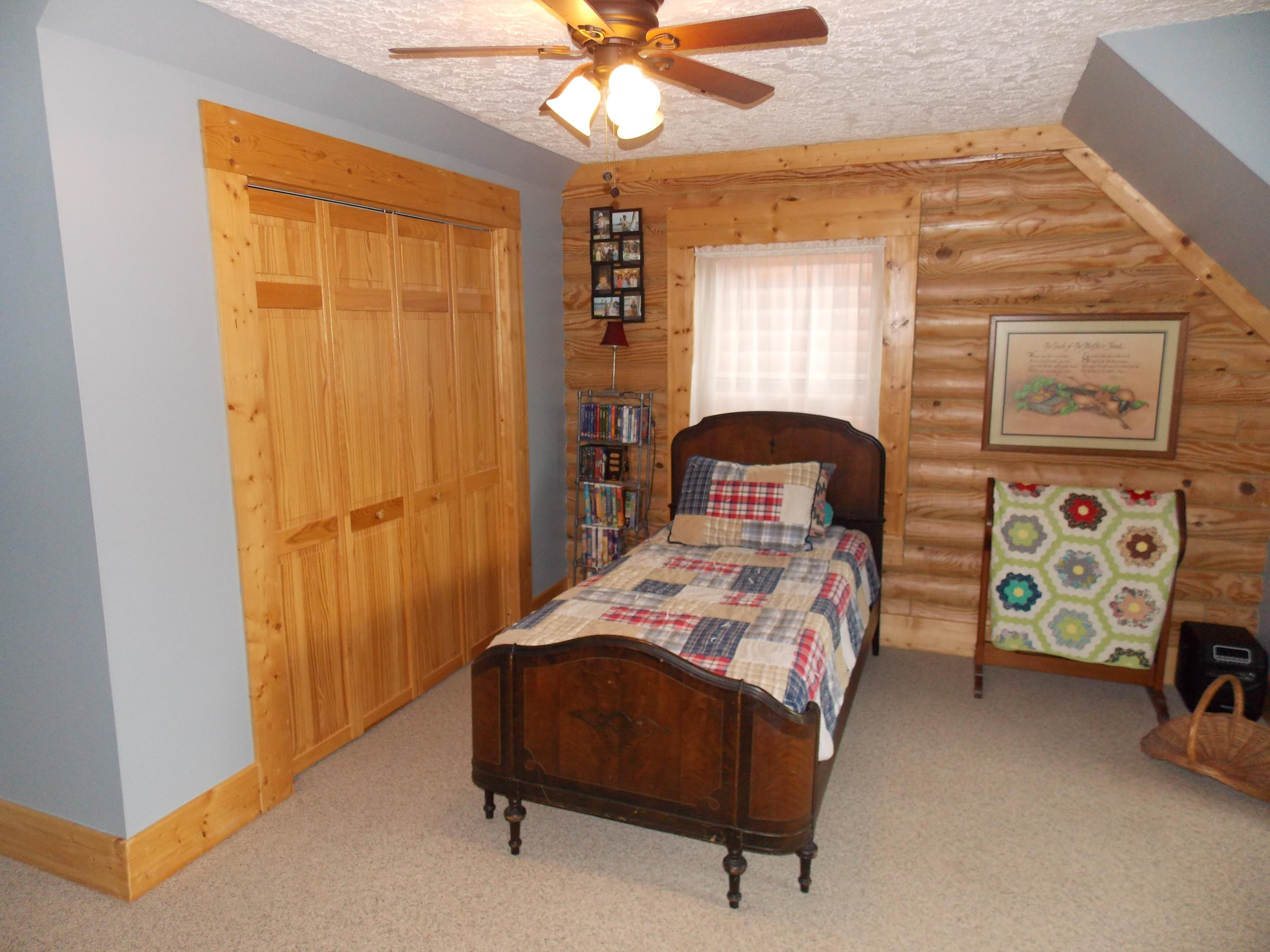 124 Ridgeview Road Northwest Floyd, VA 24091 - Photo 45 of 67 a bedroom with a bed and a window