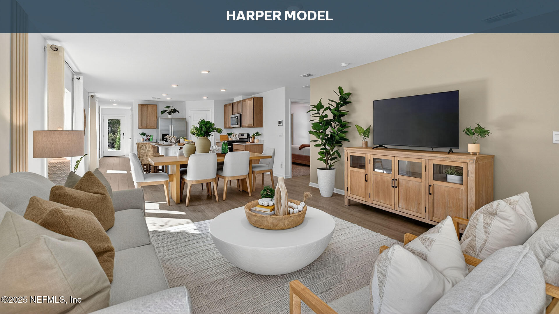 32 Flagstick Lane Bunnell, FL 32110 - Photo 14 of 61 a living room with furniture and a flat screen tv