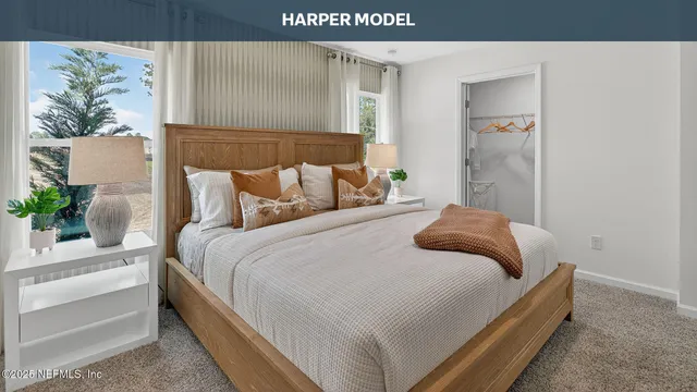 a view of walk in closet with large window