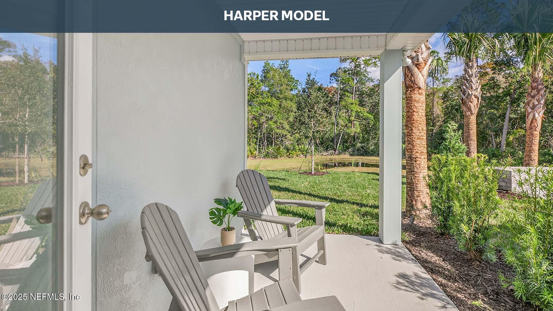32 Flagstick Lane Bunnell, FL 32110 - Photo 28 of 61 a view of a porch with furniture and garden