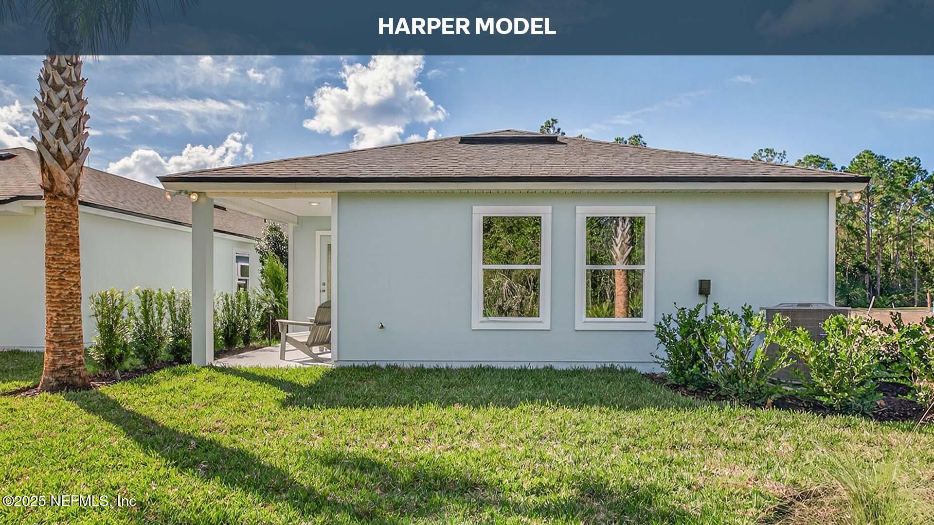 32 Flagstick Lane Bunnell, FL 32110 - Photo 29 of 61 a front view of a house with garden