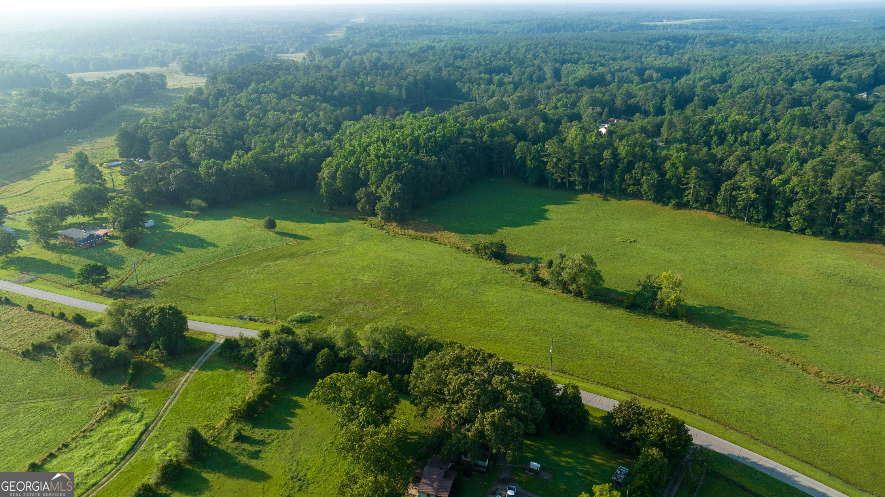 0 Welcome Arnco Road Newnan, GA 30263 - Photo 1 of 1 an aerial view of a houses with outdoor space and trees all around