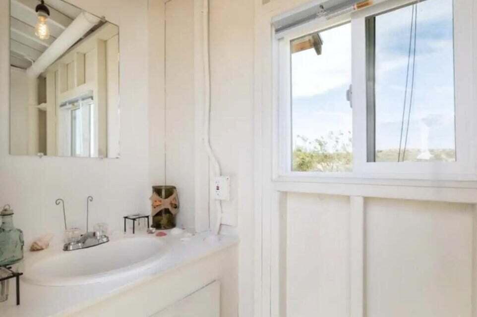 63637 Gemini Road Joshua Tree, CA 92252 - Photo 8 of 22 a bathroom with a sink and a window