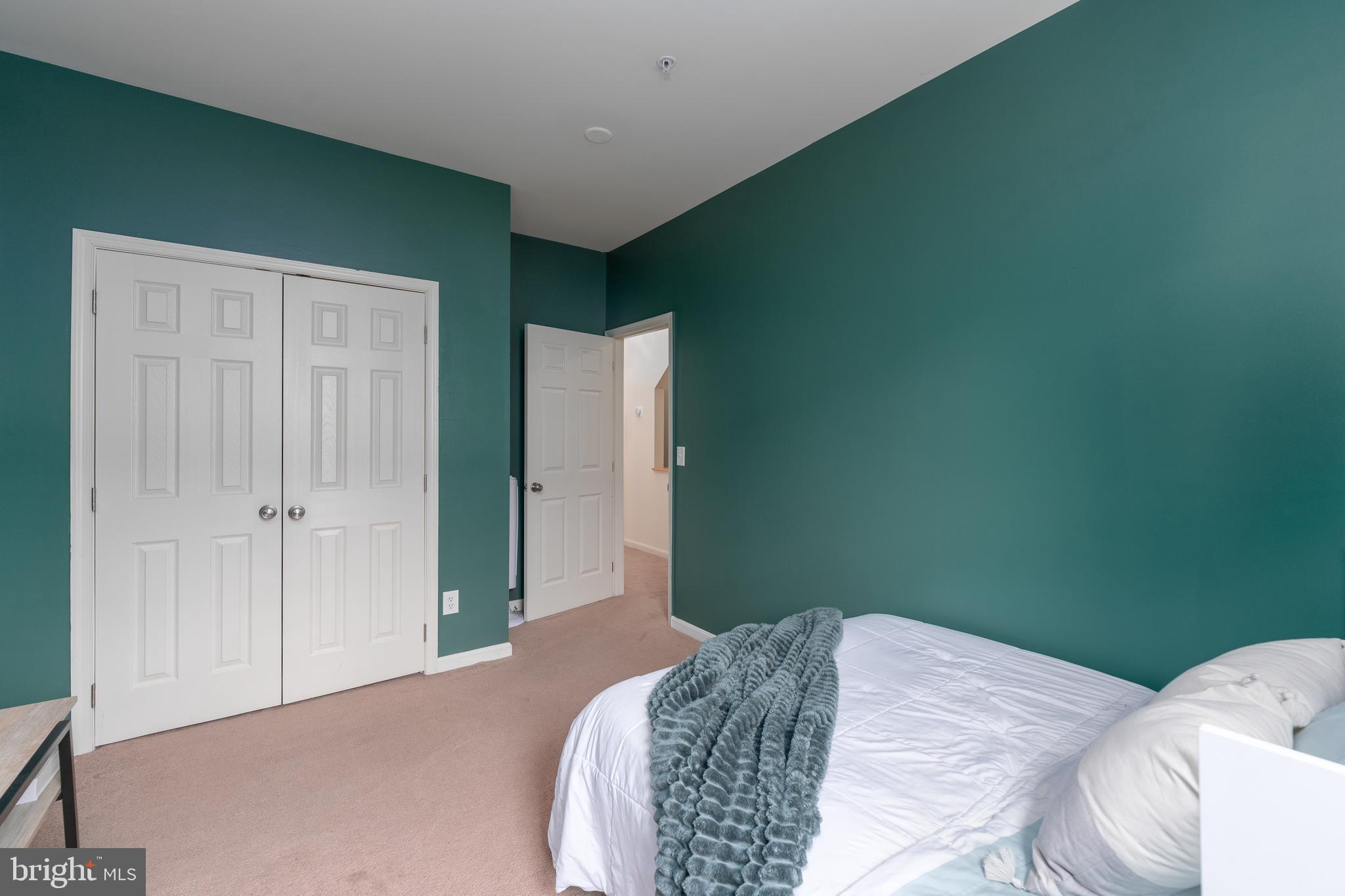 688 Luthardt Road Baltimore, MD 21220 - Photo 17 of 32 a bedroom with a bed and a window