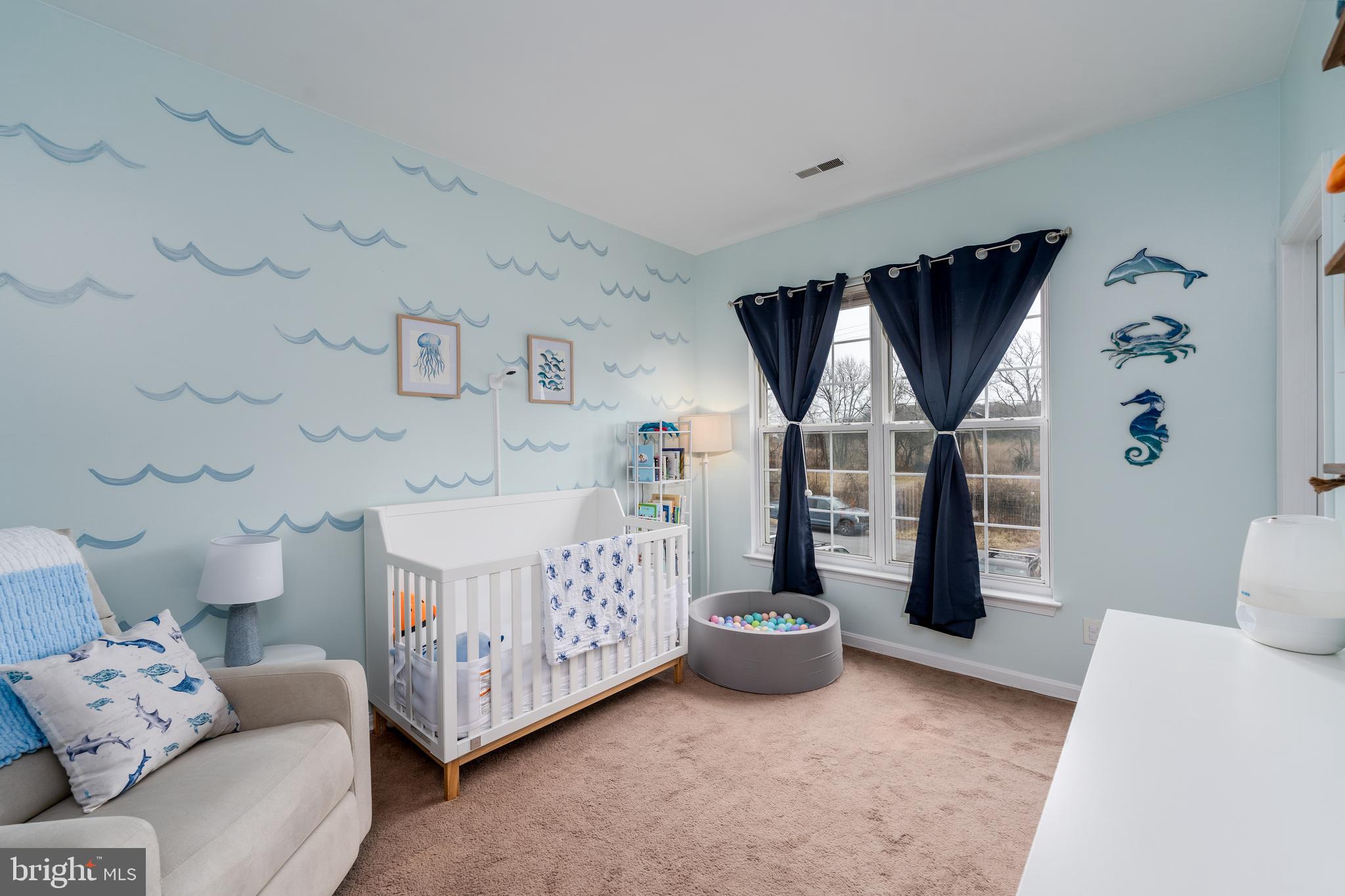 688 Luthardt Road Baltimore, MD 21220 - Photo 18 of 32 a bed room with a bed and a couch