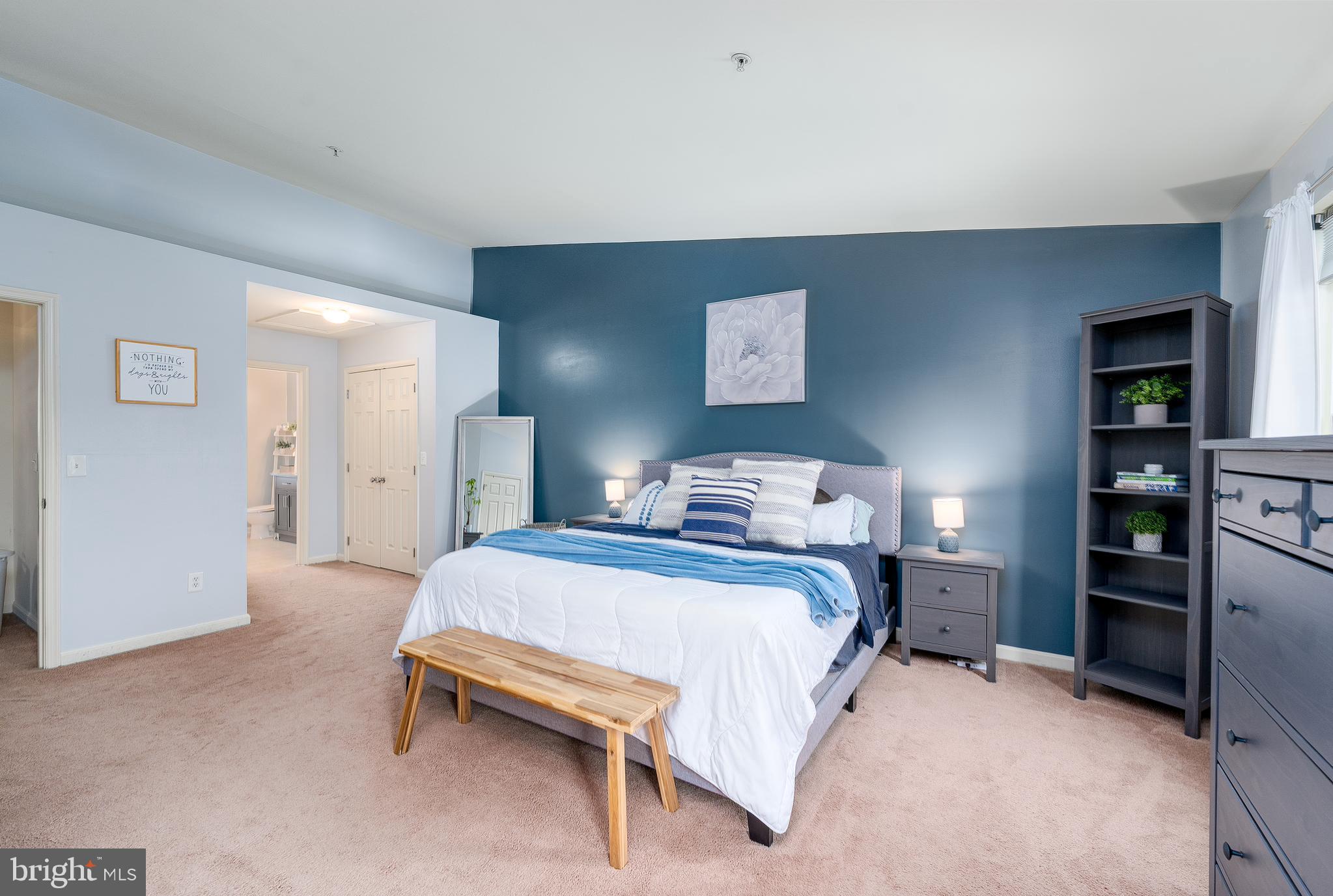 688 Luthardt Road Baltimore, MD 21220 - Photo 23 of 32 a bedroom with a bed and walk in closet